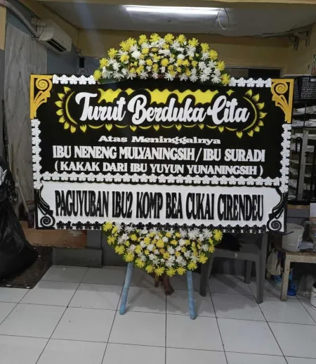Papan Bunga Duka Cikini